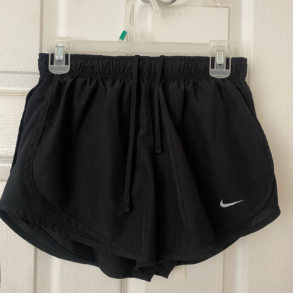 Condition: very good, strings to adjust waistband, nike sign on bottom of shorts